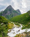 Kleivafossen waterfalls and mountains near briksdalsbreen Glacier in Norway Royalty Free Stock Photo