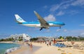 Airplane flying over Maho Beach, Sint Maarten, Dutch Caribbean