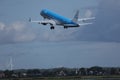 KLM plane approaching airport, cloudy Royalty Free Stock Photo