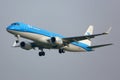 KLM Cityhopper Embraer ERJ-190STD PH-EXD landing at Schiphol airport. Royalty Free Stock Photo