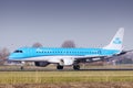 KLM Cityhopper landing at home airport, Schiphol Amstedam, Embraer