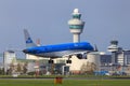 KLM Embraer 190 landing at Amsterdam Schiphol Airport Royalty Free Stock Photo