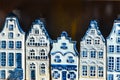 KLM houses - collection of Delft`s blue houses filled with gin as a souvenir from Holland Royalty Free Stock Photo