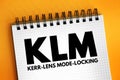 KLM - Kerr lens mode locking acronym text on notepad, abbreviation concept background