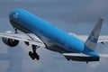 KLM plane approaching airport, cloudy Royalty Free Stock Photo