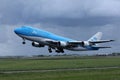 KLM plane B747 landing on runway