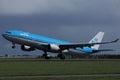 KLM plane taking off from airport, cloudy Royalty Free Stock Photo