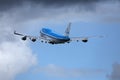 KLM plane took off from Amsterdam Airport Schiphol AMS, cloudy Royalty Free Stock Photo