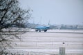 KLM Royal Dutch Airlines Boeing 737-800 PH-BXZ lands on snowy runway