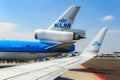 KLM Royal Dutch Airlines Boeing 737 taking off from the Amsterdam Schiphol Airport with the KLM logo on airplane wing Royalty Free Stock Photo