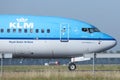 KLM Royal Dutch Airlines jet doing taxi in Schiphol Airport, Amsterdam. Closeup view of cabincrew Royalty Free Stock Photo