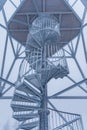 Metal construction of spiral stairs of viewing tower on top of Klodzka mountain