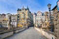 Medieval gothic stone St. John`s bridge most Ãâºw. Jana build in 1390 with historical buildings above.