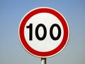 100 KM Speed limit sign a highway, one hundred kilometers per hour traffic road sign, a restriction sign for car drivers Royalty Free Stock Photo