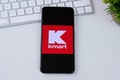 Kmart app logo on a smartphone screen.