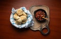 knead bread and chilean pebre sauce top view Royalty Free Stock Photo