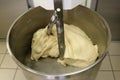 Kneading dough. Mixing dough kneading machine. Pizza dough.