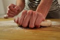 Kneading pizza dough, at home