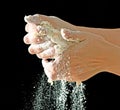 Kneading test with hands on black background