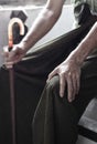 Knee joint pain in Asian old man. Concept of osteoarthritis, rheumatoid arthritis, patellar tendonitis, prepatellar bursitis, Royalty Free Stock Photo
