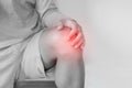 Knee joint pain, a man suffering from knee pain , on white background