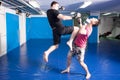 Knee kick during mixed martial art training