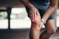Knee pain, workout and injury by athlete after fitness, running and outdoor exercise with an emergency. Closeup, hurt