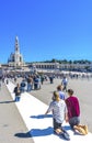 Kneeling Believers Pilgrims 100TH Anniversary Celebration Basilica of Lady of Rosary Fatima Portugal