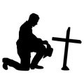 Kneeling cowboy praying on a cross EPS vector file Royalty Free Stock Photo