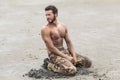 Kneeling Shirtless Soldier Royalty Free Stock Photo