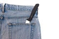 Knife in the back pocket of jeans Royalty Free Stock Photo