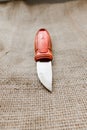 Knife on a background sacking. Royalty Free Stock Photo