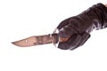 Knife in black glove isolated Royalty Free Stock Photo