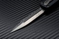 Knife blade close up. Double sharpened knife. The knife is at an angle Royalty Free Stock Photo