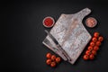 Knife, fork and cutting board, salt, pepper and other ingredients