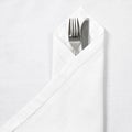 Knife and fork with linen serviette Royalty Free Stock Photo