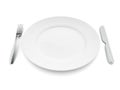 Knife, fork and plate isolated on white background. Empty dinner plate. Tableware. Royalty Free Stock Photo