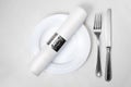 Knife, fork, plate and napkin