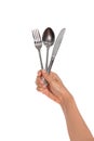 Knife, Fork and spoon held by a woman's hands isolated Royalty Free Stock Photo