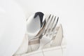 Knife, fork and spoon with linen serviette Royalty Free Stock Photo