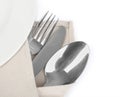 Knife, fork and spoon with linen serviette Royalty Free Stock Photo