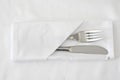 Knife and Fork with white table linen Royalty Free Stock Photo