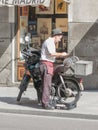 Knife grinder working on the street in Madrid Royalty Free Stock Photo