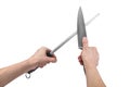 Knife hand sharpening technique - isolated on white with clipping path Royalty Free Stock Photo
