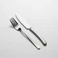 The knife has a straight blade, while the fork has four evenly spaced Royalty Free Stock Photo