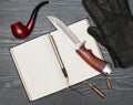Knife and notebook Royalty Free Stock Photo
