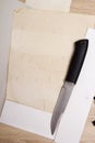 Knife in the open folder Royalty Free Stock Photo