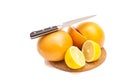 Knife with orange and lemons Royalty Free Stock Photo