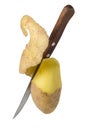 Knife peeled potatoes on a white background. Cleaning potatoes