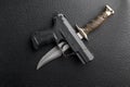 Knife and pistol Royalty Free Stock Photo